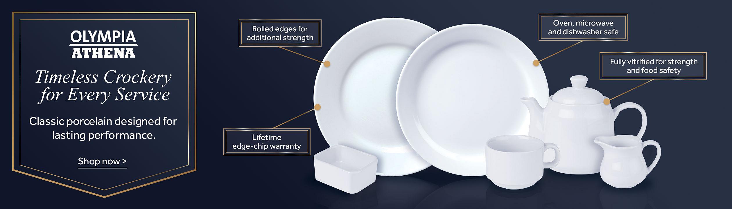 Promotional banner for Olympia Athena crockery. White porcelain plates, a teapot, cup, milk jug and small dish are displayed against a dark blue background. Callouts highlight rolled edges for additional strength, a lifetime edge-chip warranty, testing to BS4034 hotel standards, and fully vitrified construction for strength and food safety. Text reads: “Olympia Athena. Timeless Crockery for Every Service. Classic porcelain designed for lasting performance. Shop now >