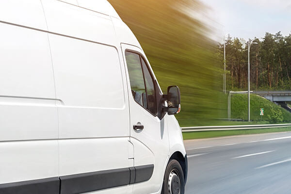 Side view of a van on a dual carriageway