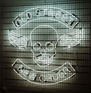 An illuminated skull and crossbones stares from the wall of Bredog's new alcohol free pub Brewdog AF, in Old Street, London