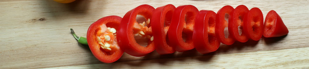 A sliced whole pepper