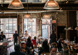 customers enjoying food and drink in a restaurant