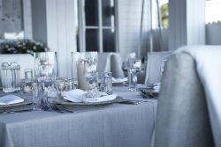Grey table setting with grey tablecloth
