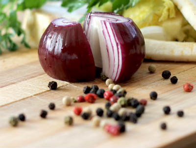 Sharp, raw red onion and peppercorns