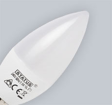 A Candle-Shaped Light Bulb A Candle Light Bulb Ideal For Chandeliers And Decorative Lighting